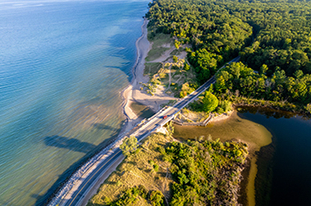bird's eye view of Lake Michigan, Duck Lake, canal and roadway