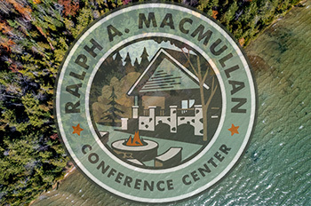bird's eye view of fall color along water with RAM Center logo