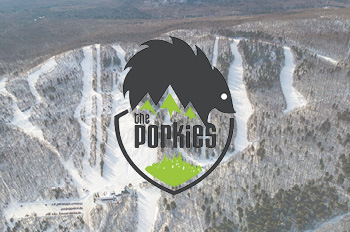 Porkies logo with snowy ski runs in background