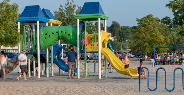 Playground with children on sunny day