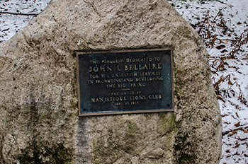 The plaque and rock highlighting John I. Bellaire are shown.