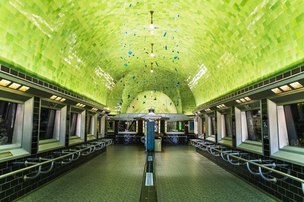 Striking peridot tiles cover the ceiling of the Belle Isle Aquarium, giving the sense of being in an underwater grotto.