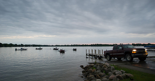 boats heading out on water for fishing tournament