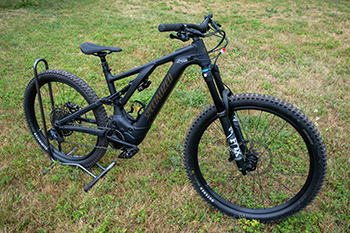 A Class-1 e-bike is shown parked. The bikes can travel up to 20 miles per hour.