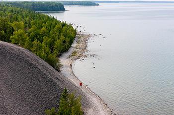 bird's-eye view of water and rocky land