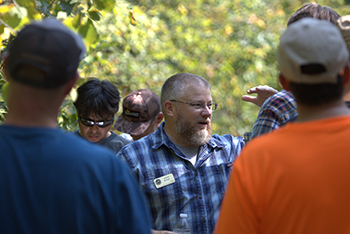 DNR upland game bird specialist Adam Bump leads tour at Gladwin Field Trial Area