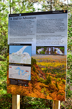 A sign in Ontonagon County highlights details of the North Country National Scenic Trail.