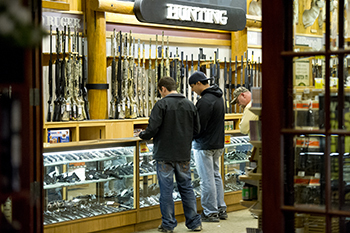 Hunters shop for supplies at the Cabelas Store in Dundee in Monroe County.