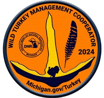 Circular yellow and orange 2024 turkey cooperator patch, with turkey track illustration, DNR logo