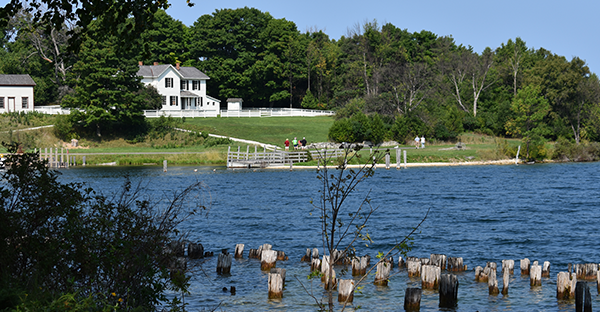 Portions of Fayette Historic Townsite from across the blue water.