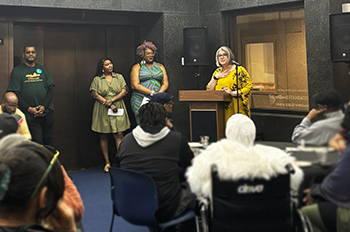 Staff of MHC and BBA announcing the partnership at a private reception.