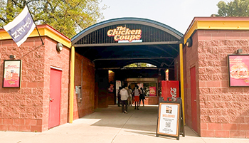 People line up for food at the Chicken Coupe on Belle Isle in Detroit.