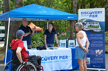 The event was put on with the help of various community partners. Here an info booth is shown.