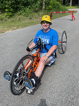 Andrew Kirsh enjoys a pedal at DiversAbility Day at Interlochen State Park.
