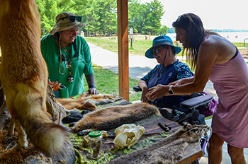 This table of animal furs was part of the fun during DiversAbility Day at Interlochen State Park.