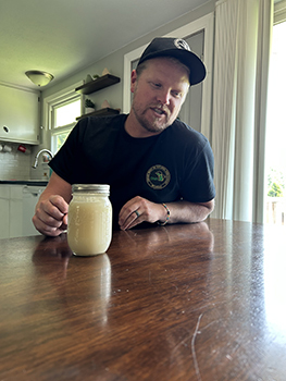 Don Brown discusses how he rendered bear fat into this bear grease and using it as a cooking oil.