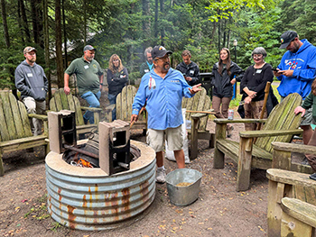 Roger LaBine, a member of the Lac Vieux Desert Band of Lake Superior Chippewa, demonstrates wild rice roasting.