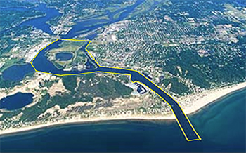 Aerial view of the port of Grand Haven; the yellow boxed area indicates the area in which the new regulations are in effect.
