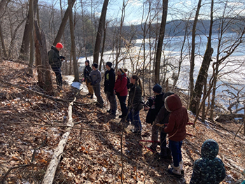 stewardship volunteers in winter forest