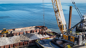 During construction of the Channel Island Reef, stone cobble was dropped into place by crane. 