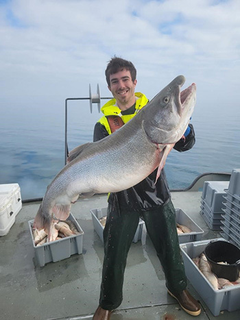 The crew of the SV Steelhead captured a 42.5-inch, 35-pound lake trout during a 2025 spring survey that they believe to have been stocked in 1995.