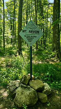 A sign designates the top of Mount Arvon in the Michigamme Highlands.