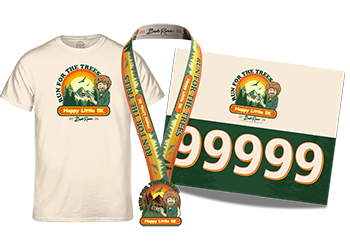 A white T-shirt, finisher's medal and race big, all with the 2026 Happy Little Trees - Run for the Trees orange, yellow and green graphics