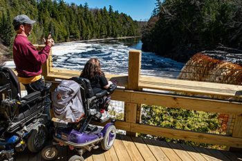 The Daverts enjoy the view from Upper Falls platform Thursday.