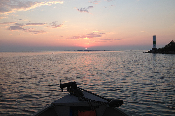 Lake St. Clair at sunset from a boat.