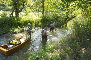 A Department of Natural Resources crew conducting a stream survey on Highbanks Creek in Barry County.