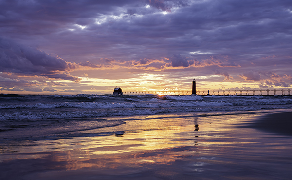 Sunset at Grand Haven State Park and lighthouse