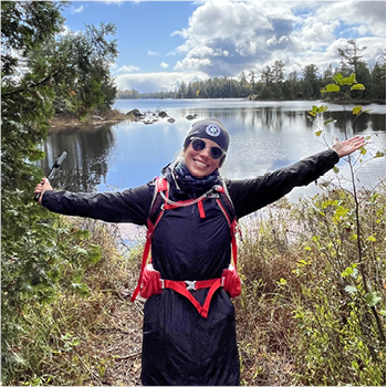 A woman hiking in a remote section of the UP
