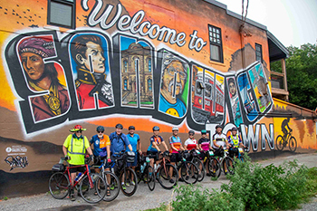 A group of bicyclists enjoys the Sandwich area.
