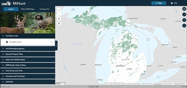 screenshot of the new MiHunt mapping tool, showing the initial layer of hunting lands (in green) on a gray, blue and white Michigan map