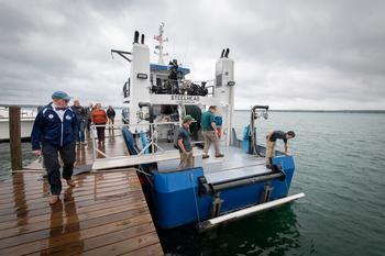Commissioning ceremony attendees toured the RV Steelhead.