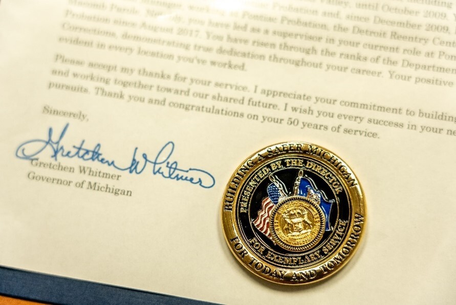Official document with Governor Gretchen Whitmer's signature on it
