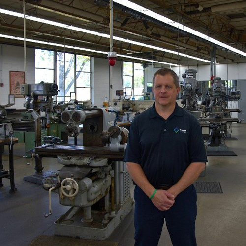 Man standing in a workshop
