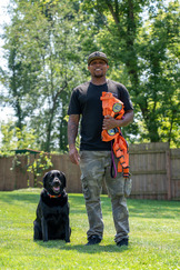 Glenn with Rue the lab at the Blue Star training center.