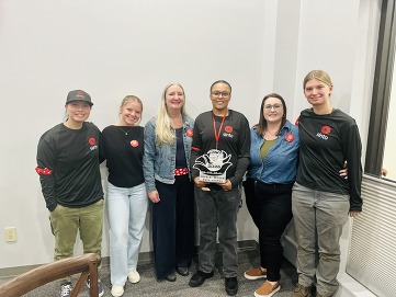 Cara with her Sinto colleagues after receiving the Rosie Award.