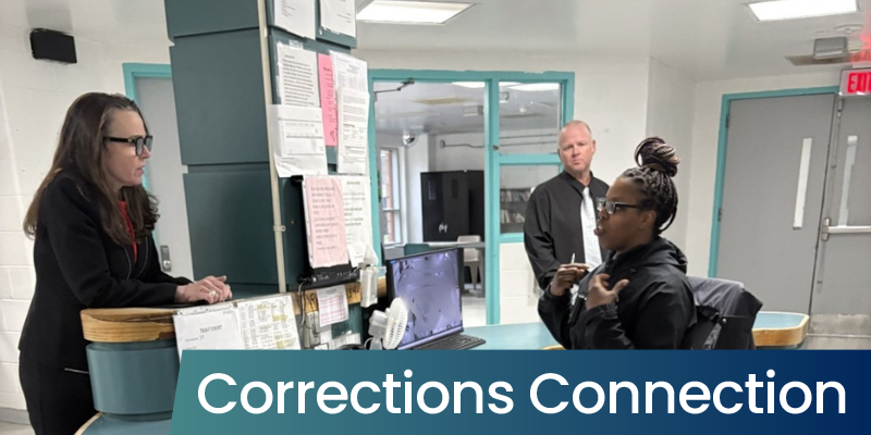 Director Washington talks with staff at WHV