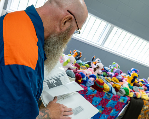 Barnett looks at memories and documentation of causes he has donated to