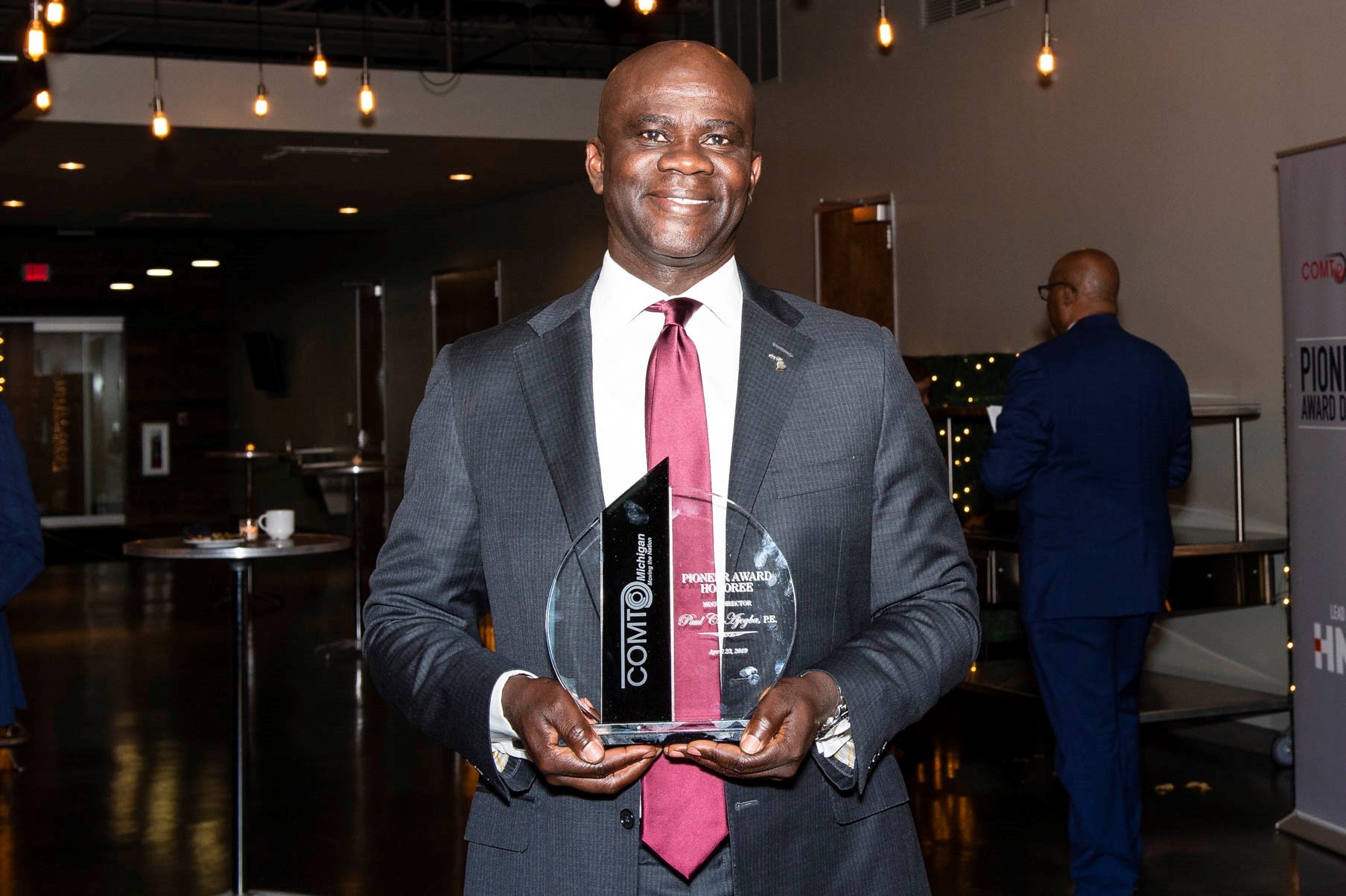 Paul C. Ajegba with his 2019 Pioneer Award