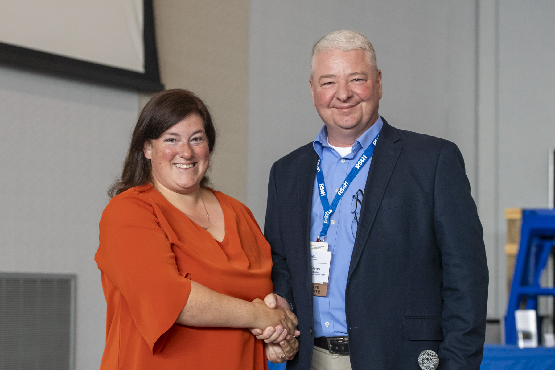 Sarah Pagano (left) of the Jack Barstow Midland Airport and Steve Smigelski, MAAE President.