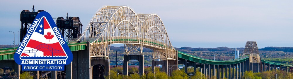 The International Bridge (IBA) on a sunny day showing the American and Canadian spans.
