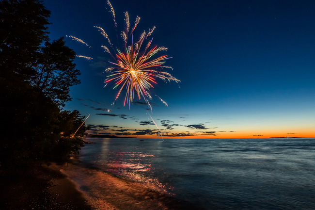 A firework over the water.