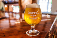 A glass of beer on a table in Marquette.