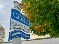 Welcome sign for Cadillac Michigan
