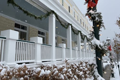 A porch along the exterior of the Perry Hotel during winter. 