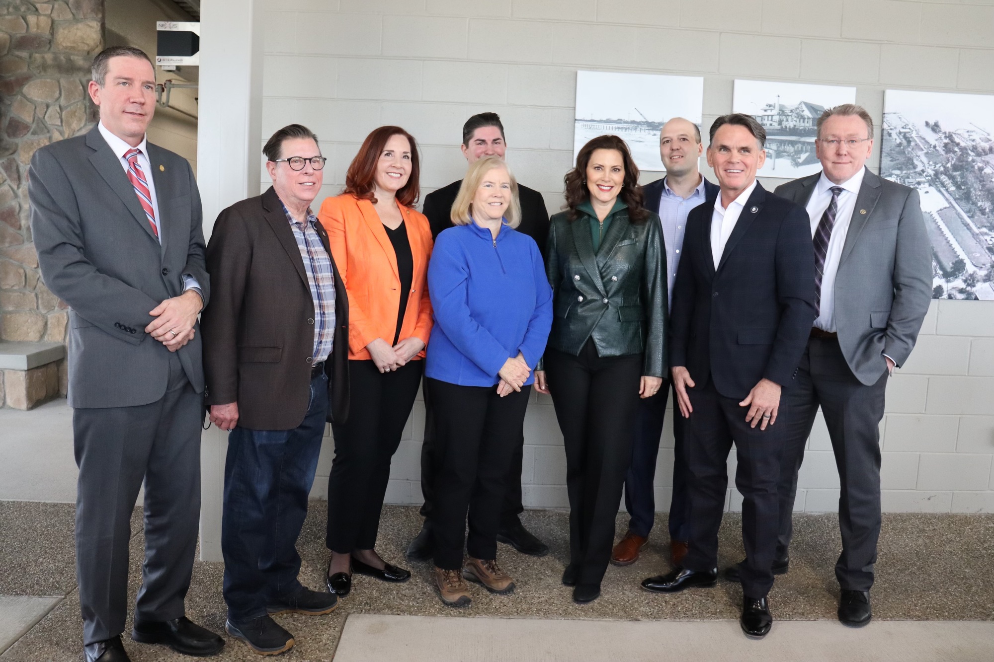 Gov. Whitmer with a small group of people at the Building Michigan Together Event 