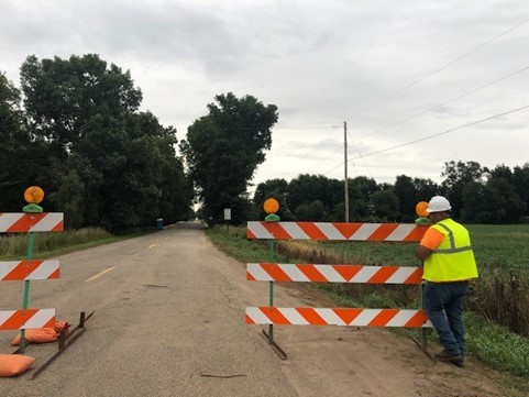 workers remove barricades on Five Point Hwy